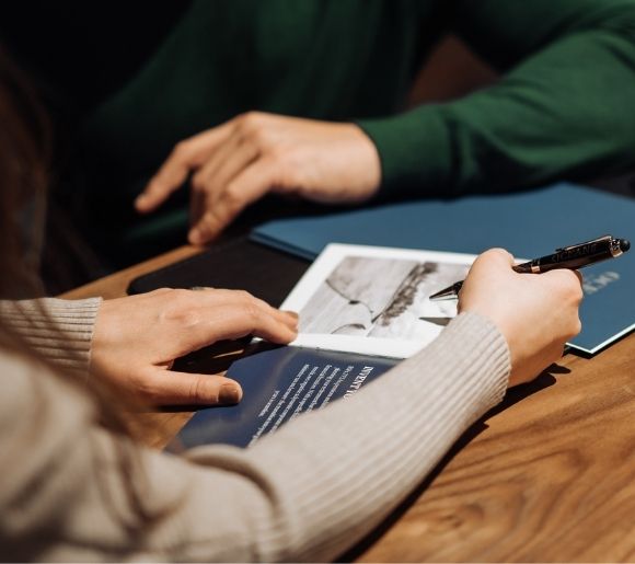 Two advisors go through The Blueprint brochure
