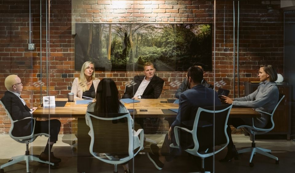 Financial advisor meeting with team
