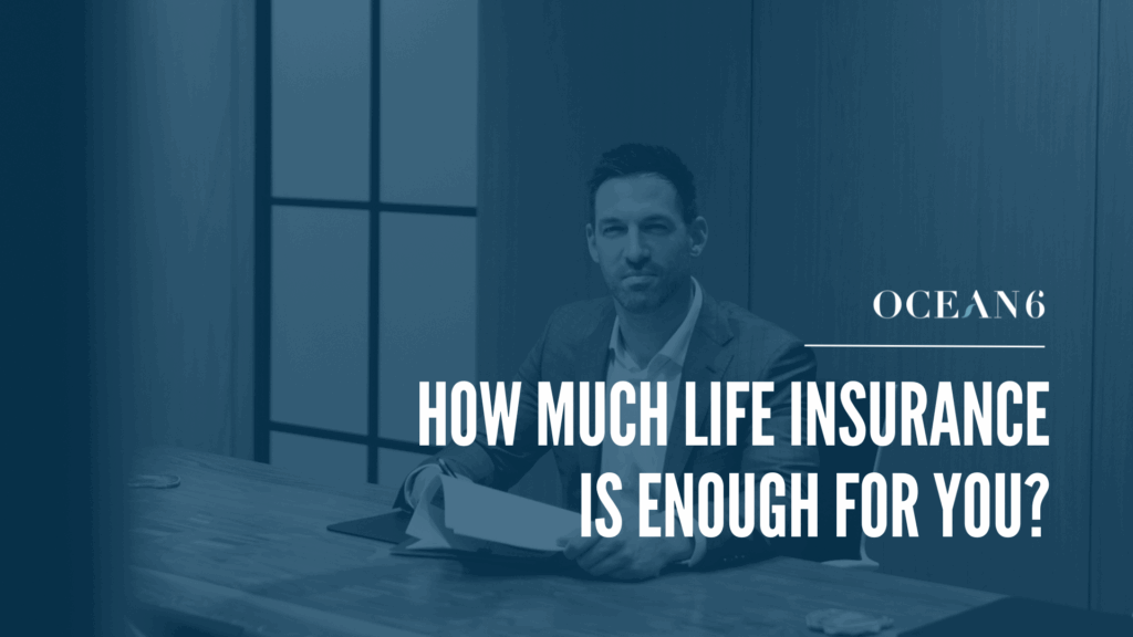 Expert fee-based financial advisor sitting in a boardroom looking through papers and smiling - blog thumbnail: How Much Insurance Do I Really Need?