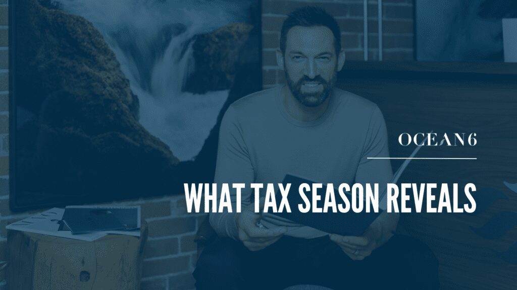 Business owner reviewing tax documents and reflecting on financial patterns
