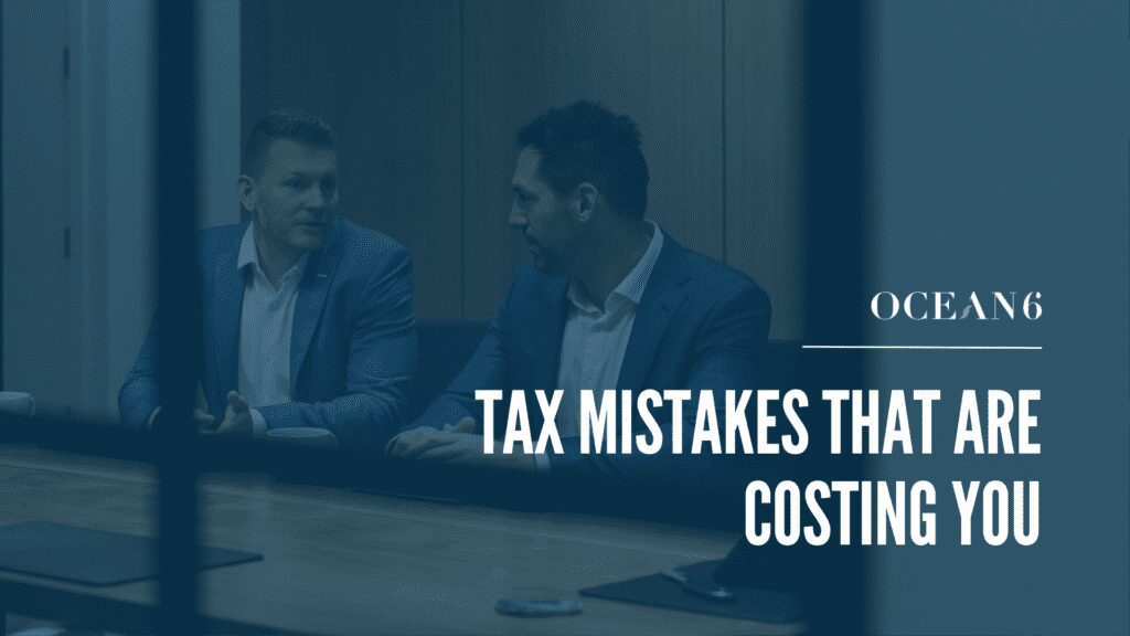 business owner reviewing finances and identifying tax mistakes in Canada